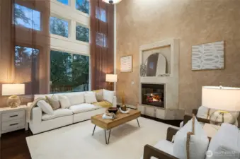 Wall of windows and a gas fireplace make this room the heart of the home.