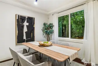 Formal dining room with ceiling detail and green views!