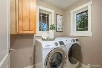 Convenient upstairs laundry.