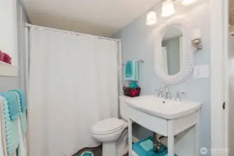 Bathroom with full tub and shower