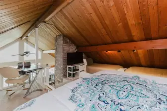 Loft bedroom looking out toward view...cloudy the day photos were taken.