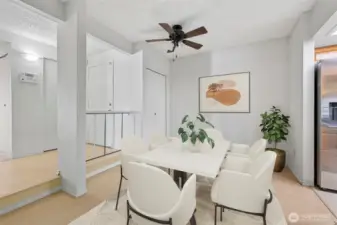 Bright dining area with modern finishes, ceiling fan, and open layout—perfect for everyday meals or entertaining