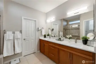 Large primary bathroom with double sinks.