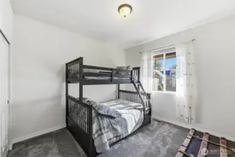 The guest bedroom is adjacent to the updated full bath.