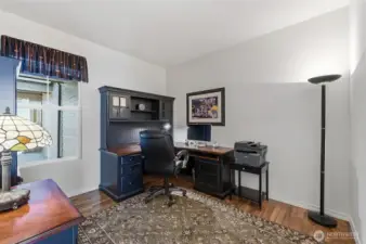 The home office separates the 2 bedroom wings and creates privacy for both spaces.