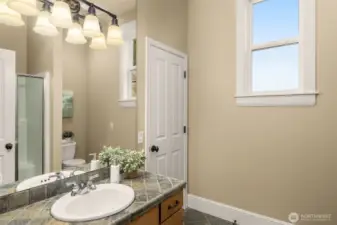 Main floor 3/4 bathroom with shower out of frame.