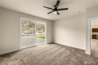 Slider to backyard off primary bedroom