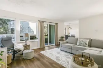 Living Room looking towards balcony and Dining Room.