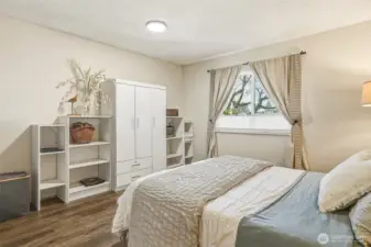 Primary bedroom. The closet system helps keep everything organized.