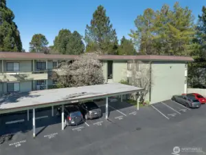 View of 18906 building. Parking spot #90 is the closest uncovered spot to the stairwell leading up to the unit.