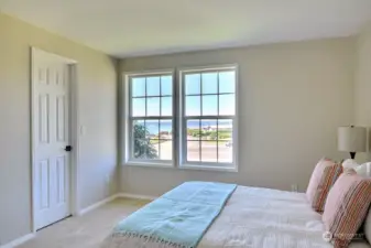 You may find this front bedroom is a place that people will linger in.   Freshly painted with a beautiful view, walk-in closet - what's not to love?