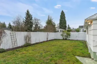 Fully fenced backyard.