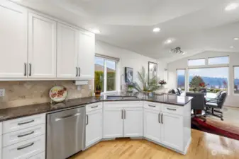 Observe the one of a kind custom cabinetry, granite countertops and under mount sink. Bring your culinary cuisines and let your inner chef create fabulous dining masterpieces in this terrific environment.