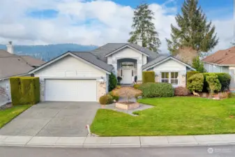 The cathedral style entrance with sweeping views from doorway to back deck are breathtaking! With all the new built in amenities this is such a low maintenance home for anyone to enjoy.