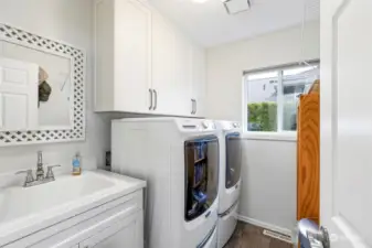 Even the laundry was upgraded! The garage also has custom cabinets and a generac for any electrical outages.