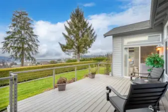 Entertain with your friends or family on this expansive deck that has access to kitchen/ primary bedroom.