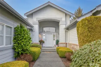 The grand entrance to the home is just one more accent that invites you and others to come visit you in this mature neighborhood of Port Ludlow.