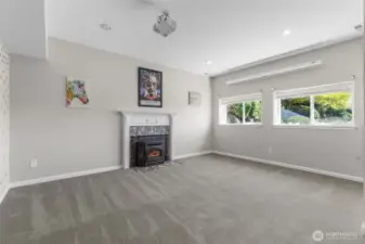 Game/Rec room. Equipped with projector & big screen for movie night! Cozy Fireplace.