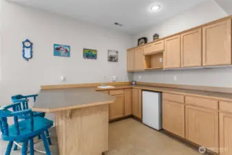 Wet bar off of the game room.