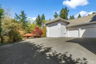 Oversized 3 car garage with an RV bay.