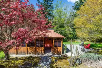 Cabana in back. Lovely landscaped yard.