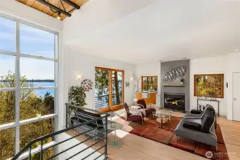 Notice the gas fireplace & sliding glass door to let in some fresh air!