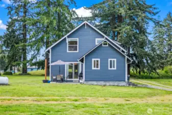 View of the back of the cutest farmhouse EVER!