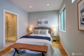 Primary suite features luxurious 3/4 bath