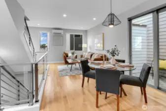 Open concept living & dining area!! Dining with sliding glass door to private balcony