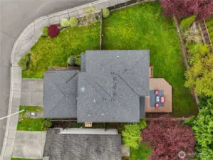 Stunning bird's-eye view of the property, showcasing the spacious yard and prime location
