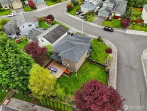 Stunning bird's-eye view of the property, showcasing the spacious yard and prime location