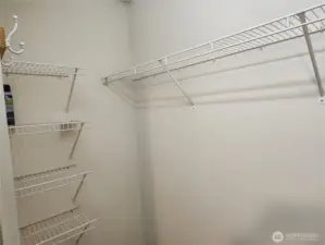 Primary walk-in closet provides plenty of space for your wardrobe!