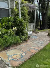Seller designed this very beautiful stone and glass bead path to the Arbor. Please be careful to steop on the rock stones as the glass beads can be slippery when wet.
