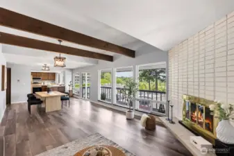 View from living area, into dining and kitchen.