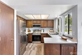 Kitchen, newer appliances and wine fridge.