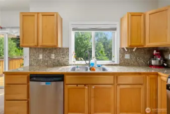 Kitchen with ample cabinet storage & counter space