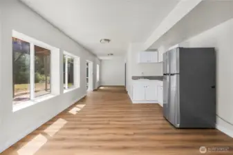 Huge basement living space with kitchenette. Fridge does not convey; goes w/ seller