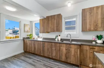 New cabinetry, new sink, new quartz counters.
