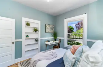 Built in closets and shelving provide ample storage.