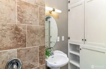 Wall of storage in the bathroom also.
