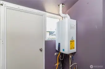 The enclosed back porch houses the on demand water heater.