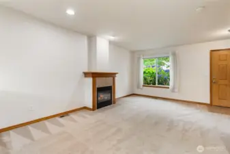 Spacious living room with gas fireplace