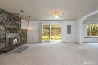 Living room view from kitchen and brand NEW electrical panel.