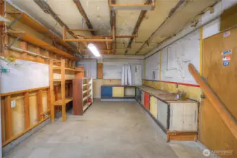 There is lots of space to work on your hobbies in the workshop portion of the detached garage