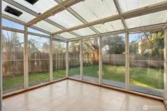 Fully enclosed sunroom of the rec room - great place to relax or exercise