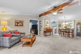 Vaulted ceilings with natural wood accents and warm tones throughout