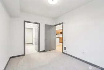 Sophisticated primary retreat featuring a spa-inspired ensuite with a double vanity and a spacious walk-in closet