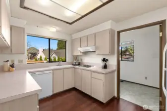 Kitchen sits off laundry room with huge pantry!