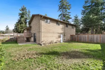 Large, level backyard is fully fenced.
