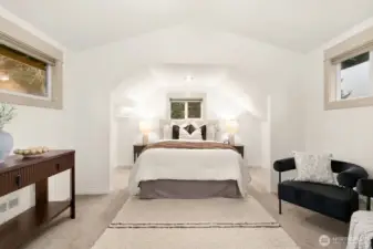 Primary suite with vaulted ceilings